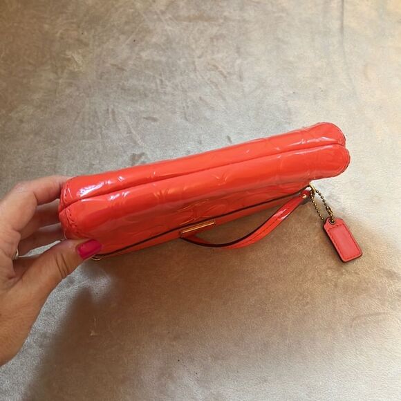 Coach Coral Orange Patent Embossed Logo Wristlet - Picture 7 of 10